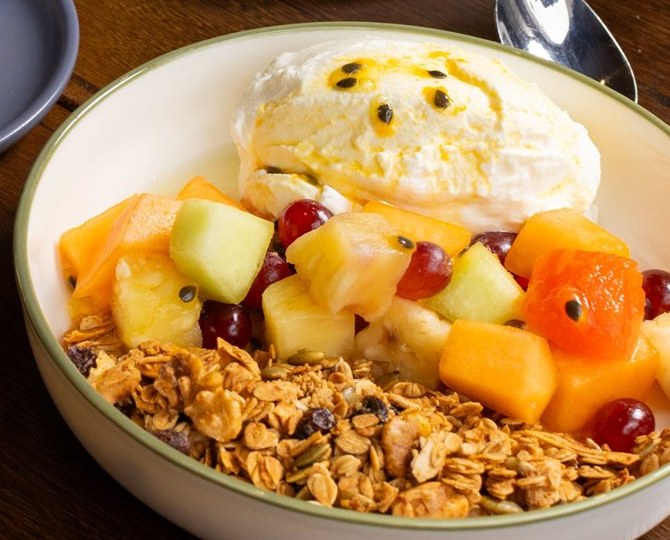 Seasonal fruit and granola bowl